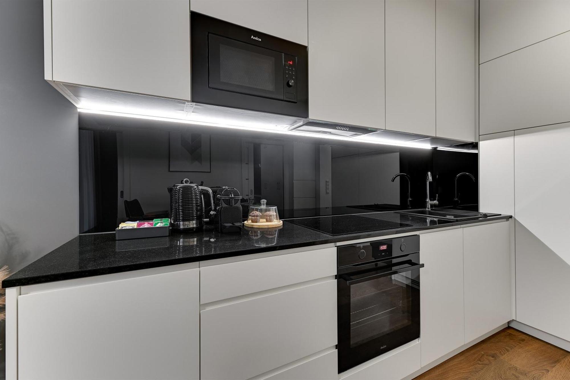 Granaria Deluxe & Riverside By Downtown Apartments กดัญสก์ ห้อง รูปภาพ